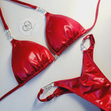 Red wet look wellness posing suit