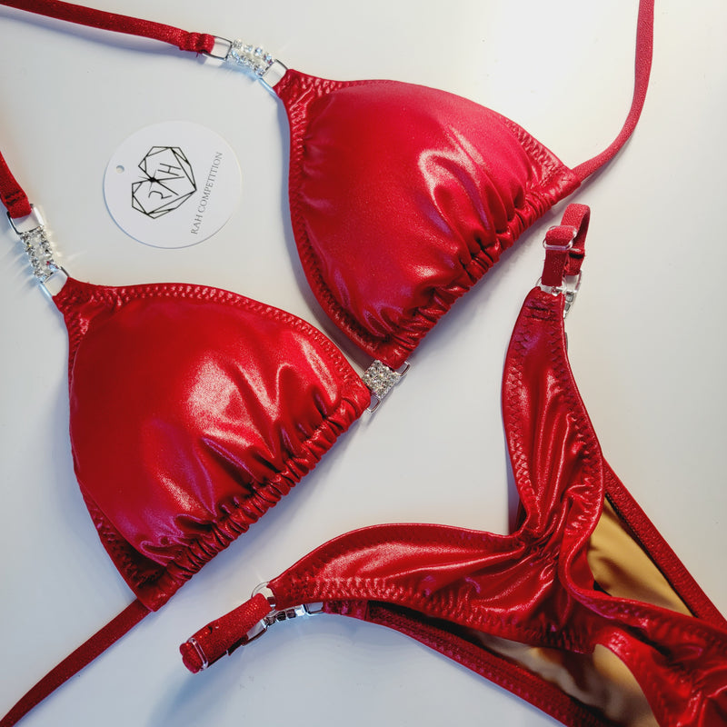 Red wet look wellness posing suit