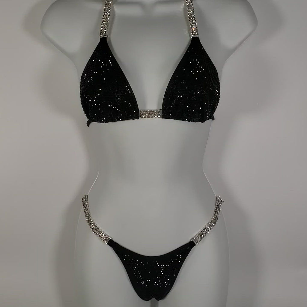 Video of black competition suit. jet black women's body building bikini, npc bikini, ocb bikini, gob bikini