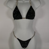 Video of black competition suit. jet black women's body building bikini, npc bikini, ocb bikini, gob bikini